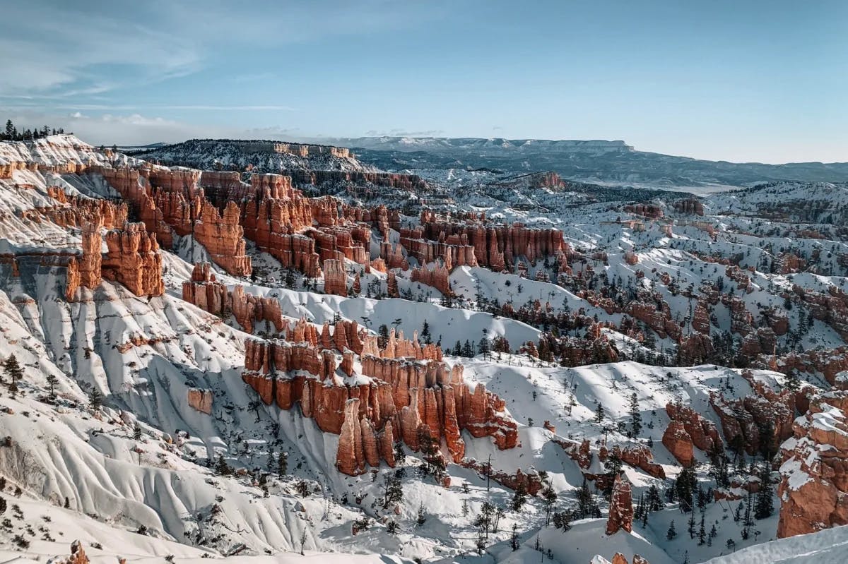 Snow blankets red rock formations at Bryce Canyon National Park
