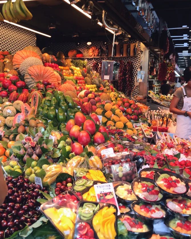 An array of colorful produce at Mercado de La Boqueria market