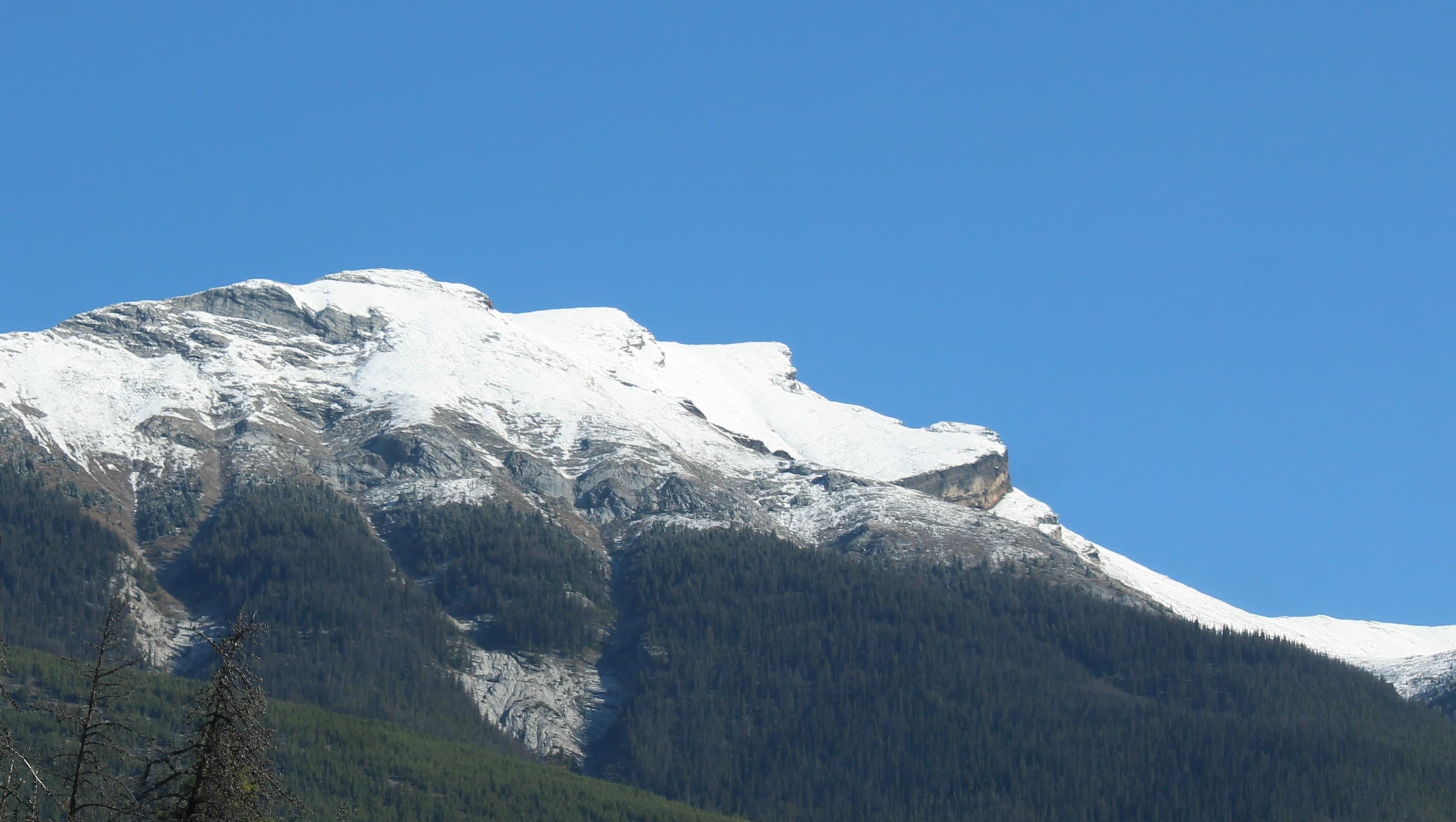 Mountains and water under blue sky