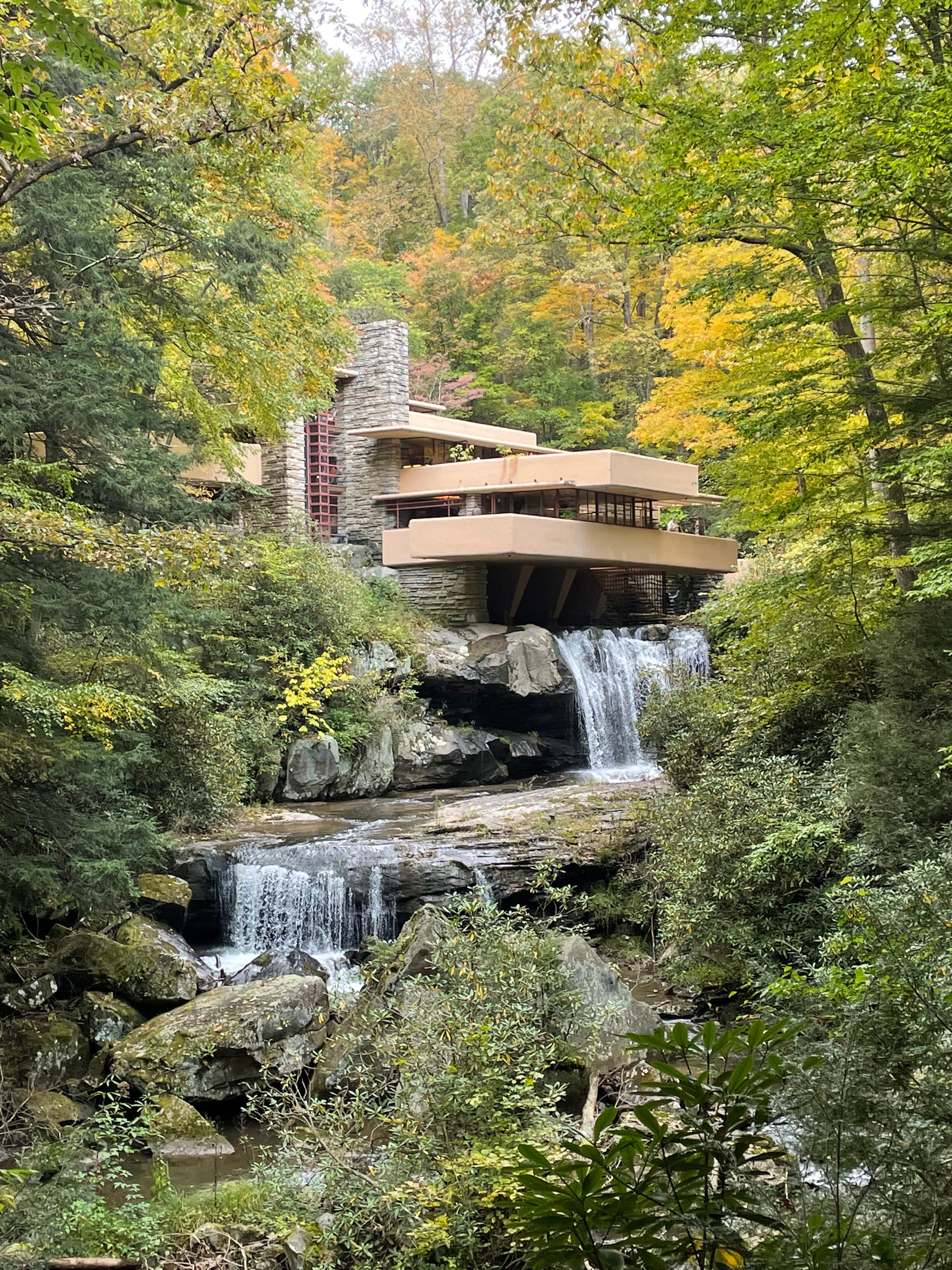 A house built over a multi-level water fall