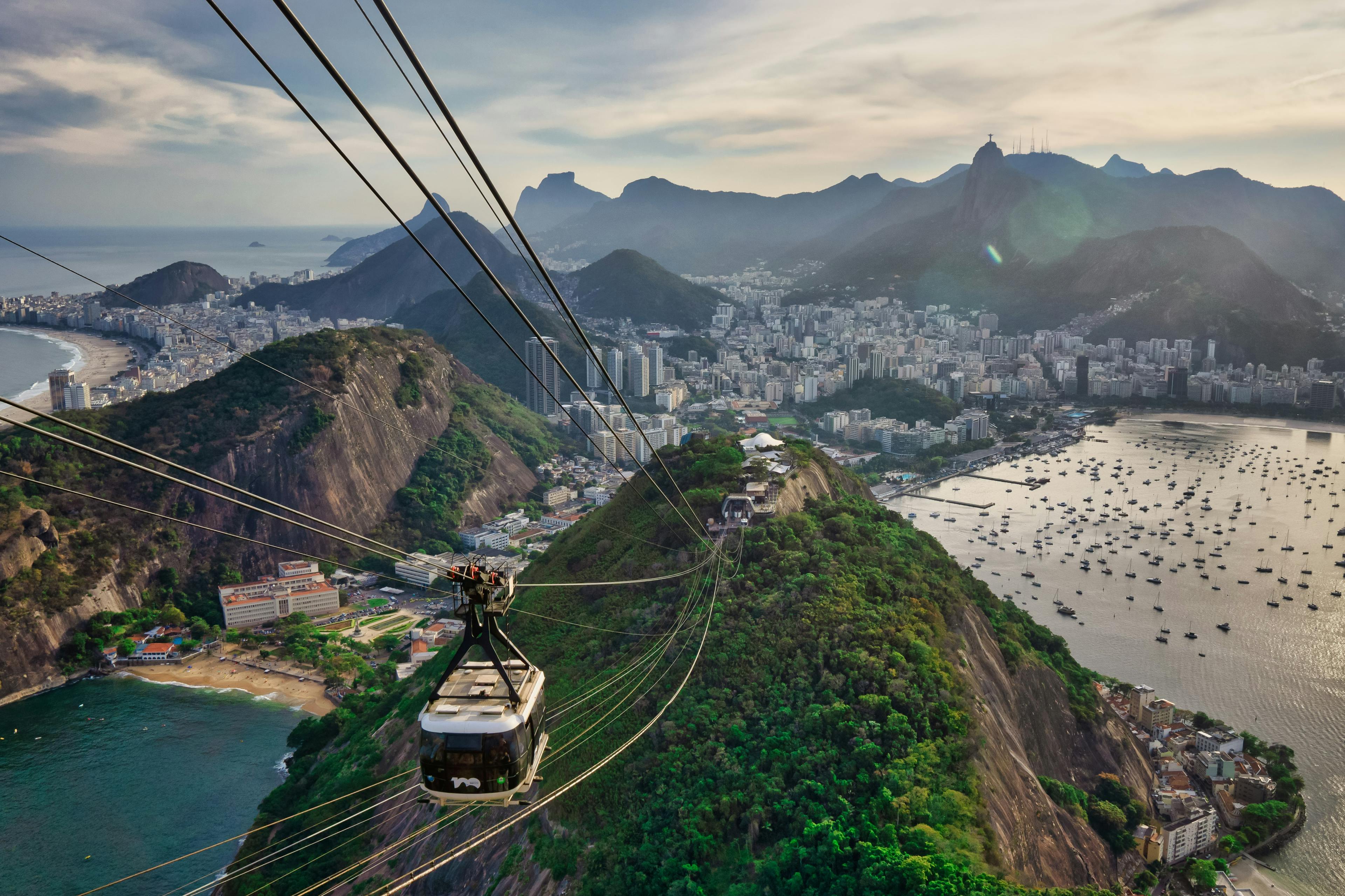 City of Rio de Janeiro beside lush green mountains and ocean