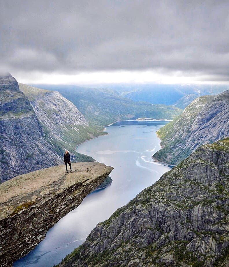 A lake between rocky mountains.