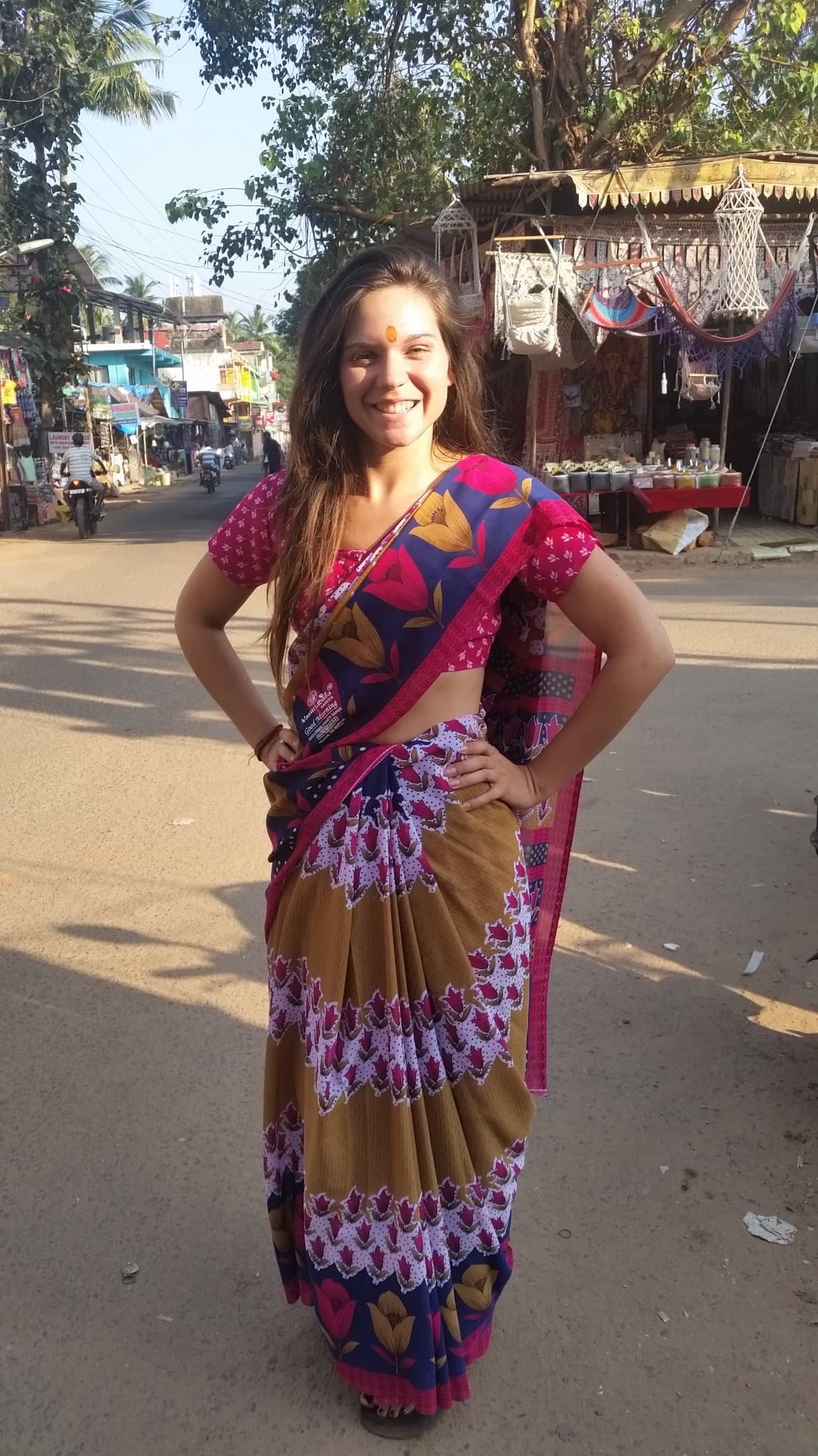 Travel advisor posing in traditional saree dress