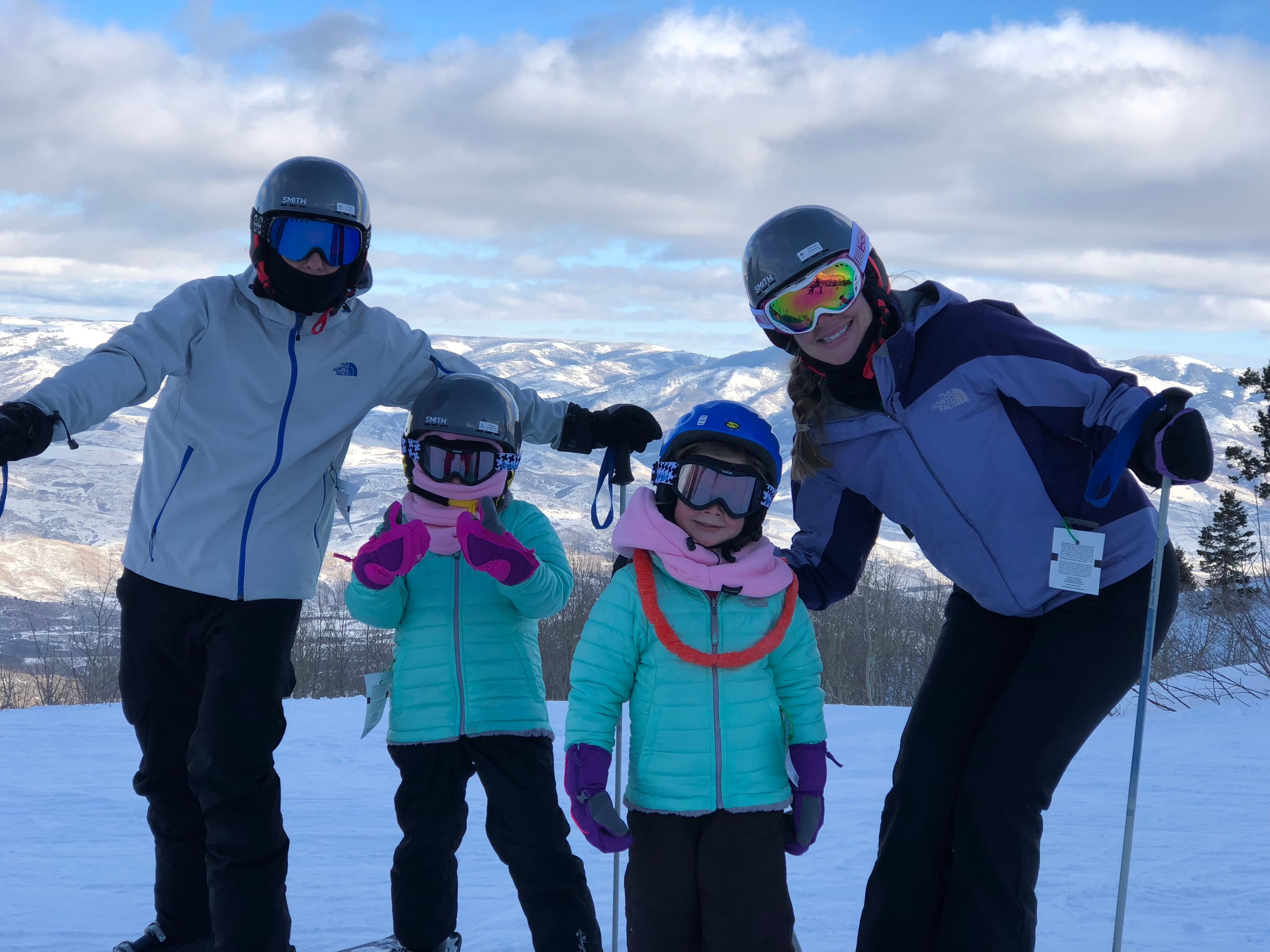 Posing for a photo in ski gear
