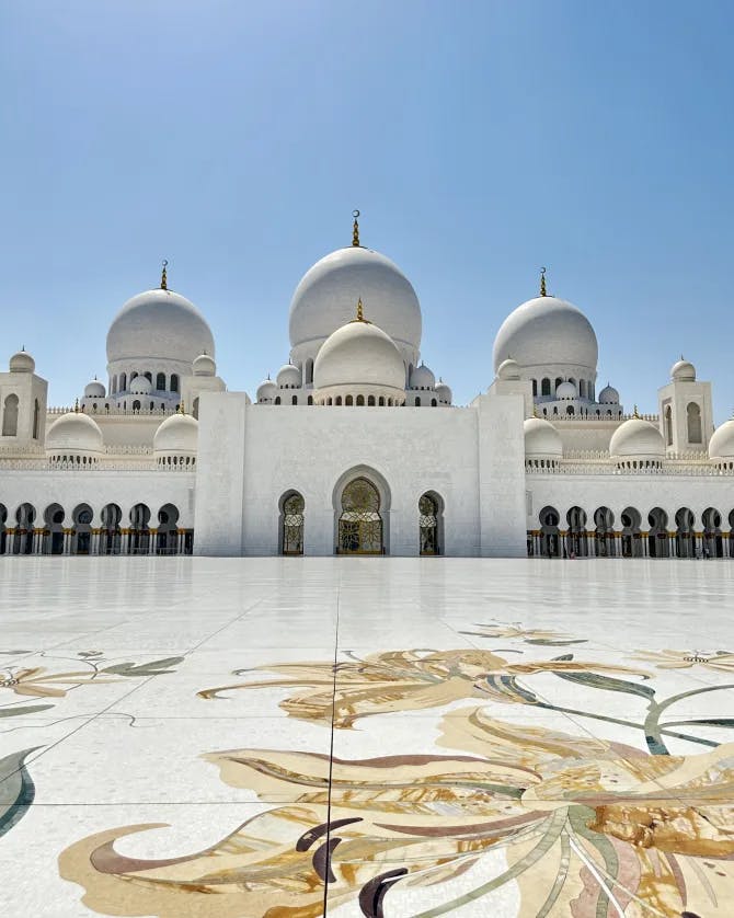 Picture of Sheikh Zayed Grand Mosque with beautiful tiling in front of the building