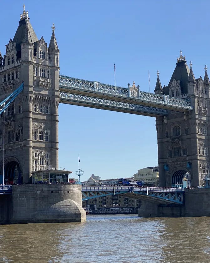 london bridge during the day time with clear skies in the distance. 