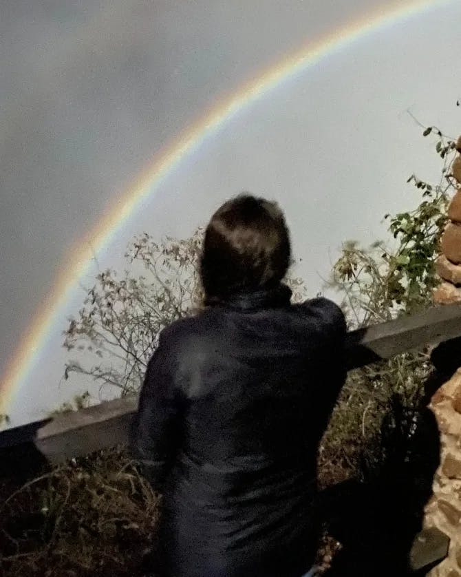 Girl enjoying the Rainbow