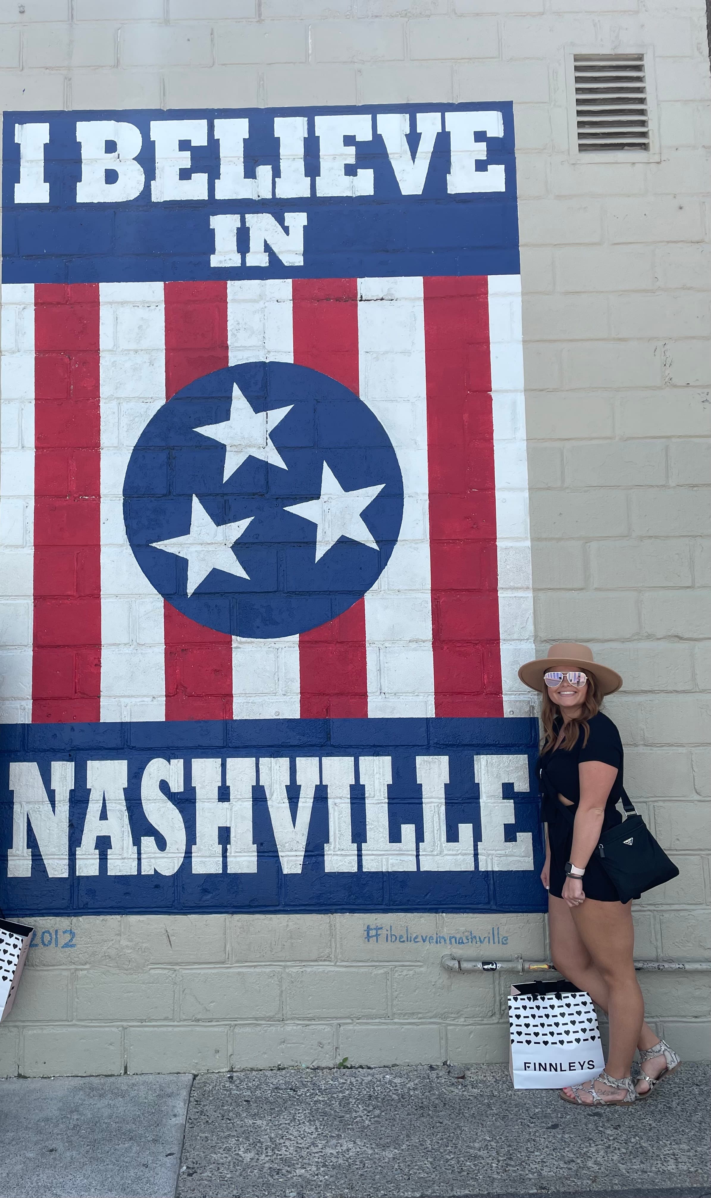 Picture of Makeena with I Believe In Nashville written on wall