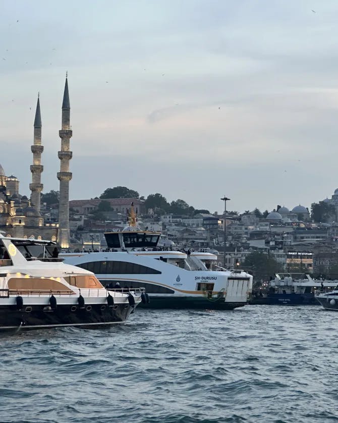 Picture of boats on the water at Yeni Cami Mosque at Bosphorus