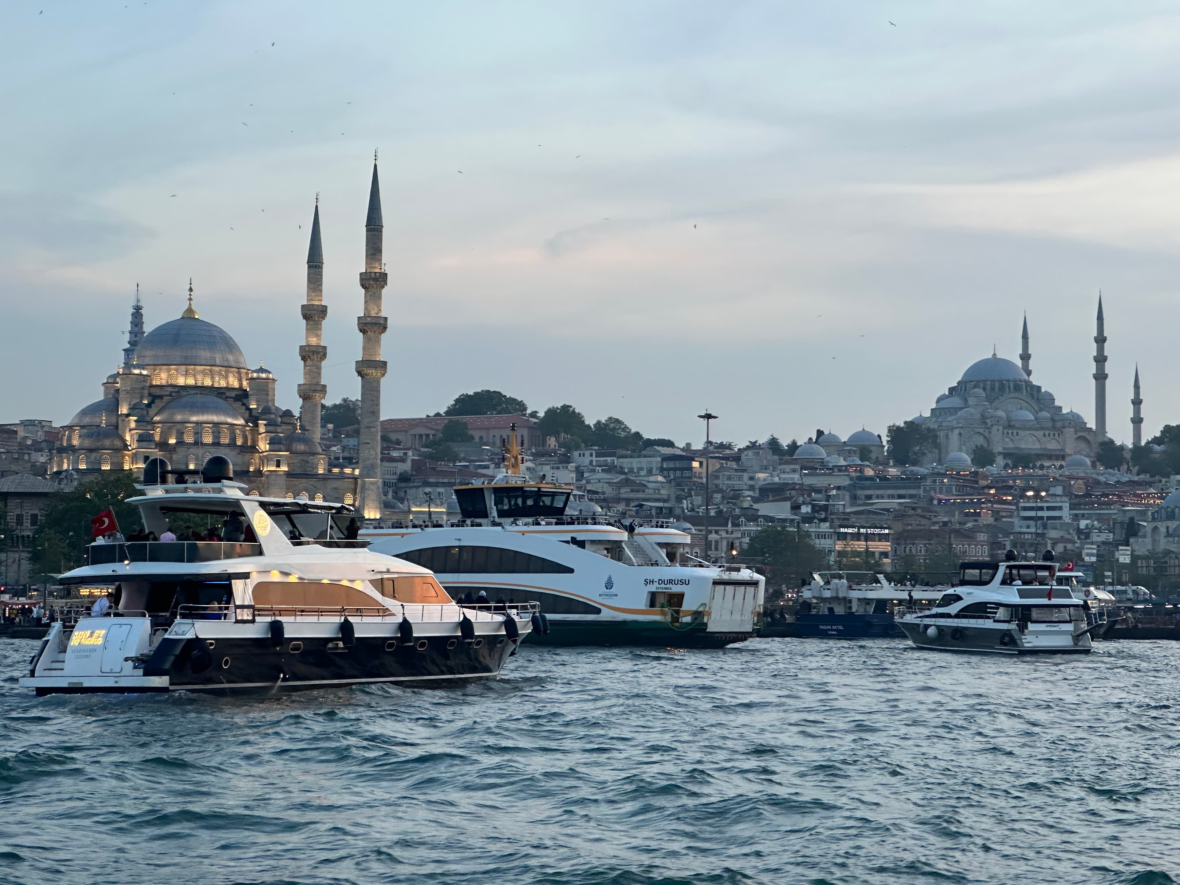 Picture of boats on the water at Yeni Cami Mosque at Bosphorus