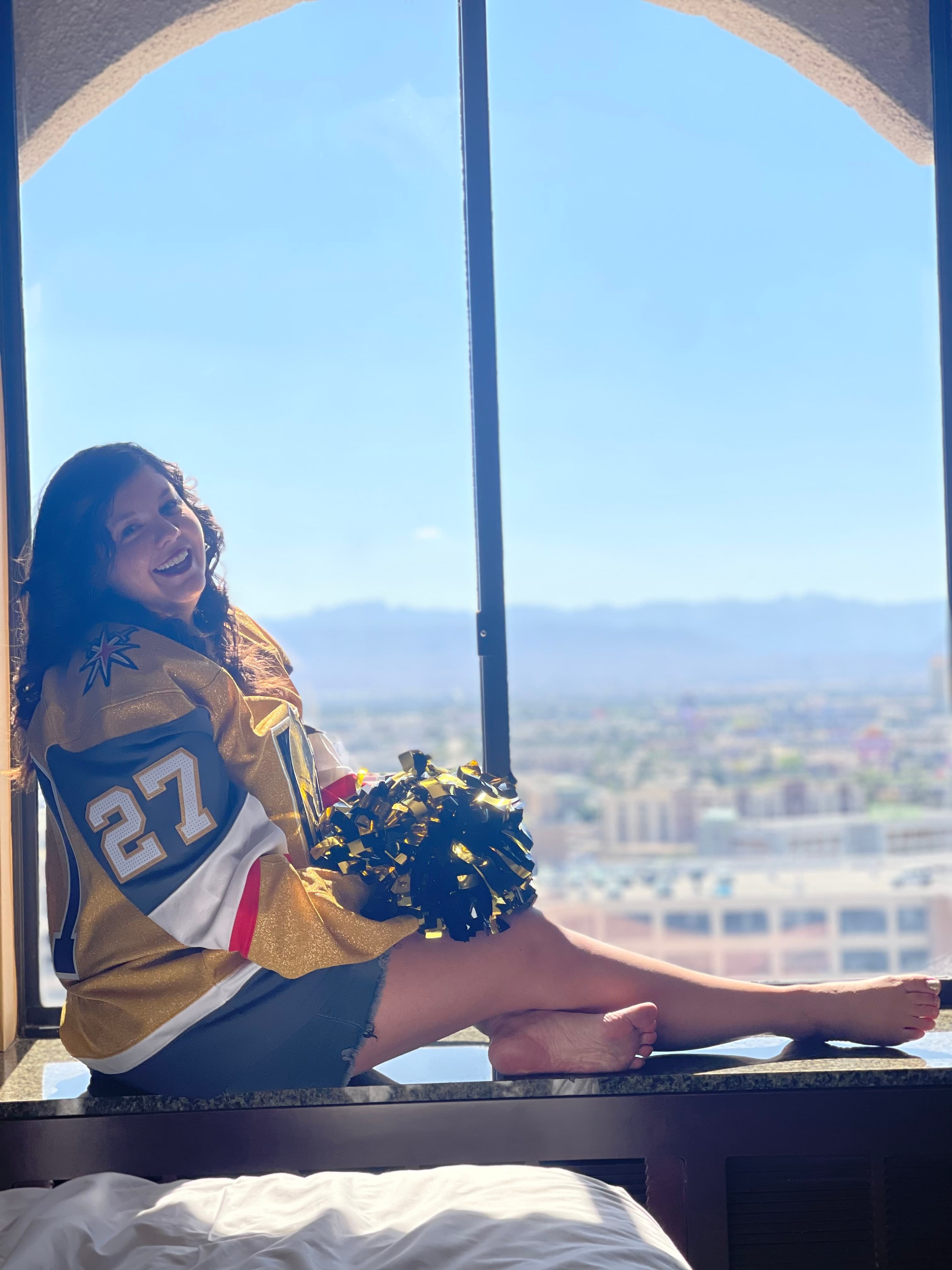 Picture of Christina sitting on window