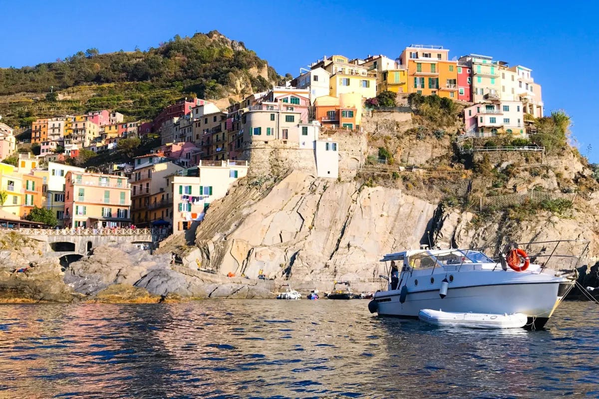 Book a private boat tour to explore the coast and discover hidden gems.