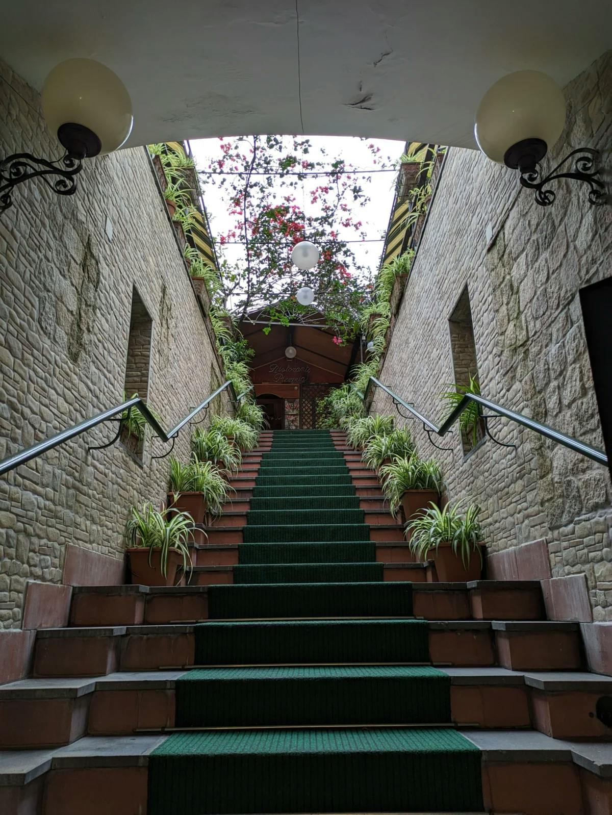 A photo of an outdoor staircase taken from the bottom