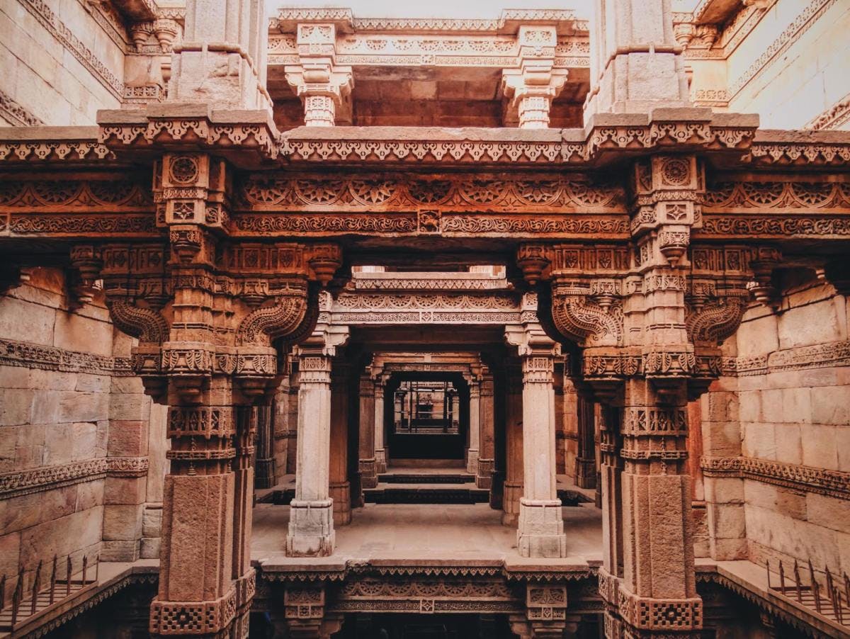 Ancient stepwell made of brown stones in Adalaj in Ahmedabad, India.