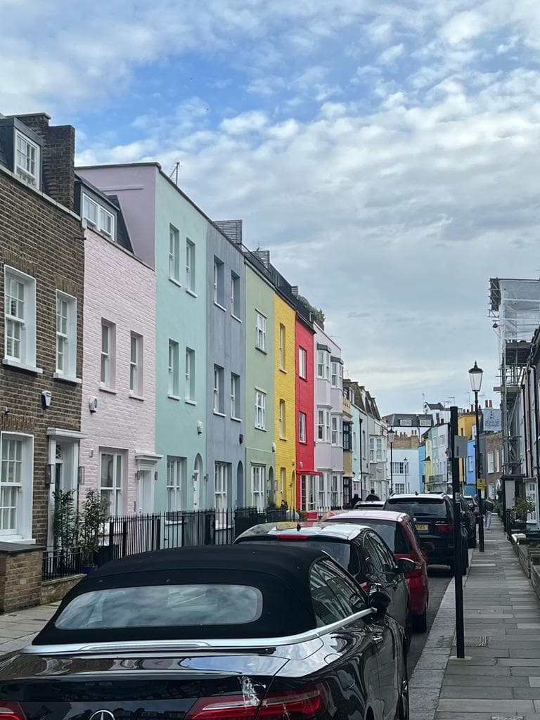 View of the road with car and houses on the side