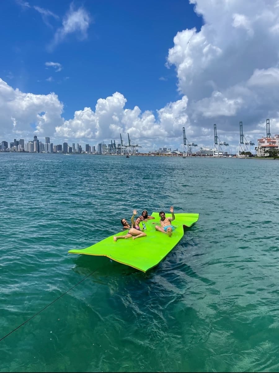 Group of people posing in sea