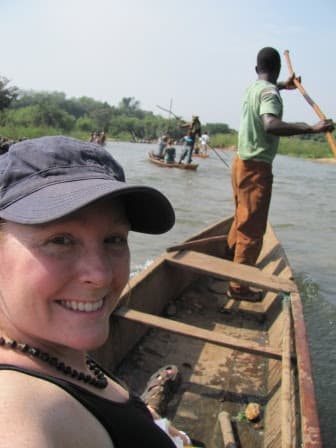 Travel advisor posing on a boat