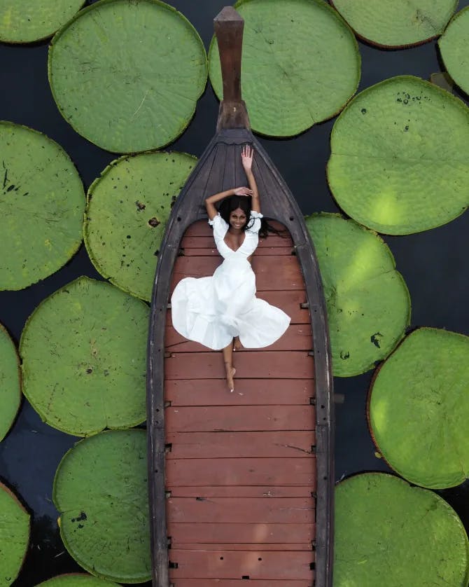 Picture of Mesha in white dress in boat