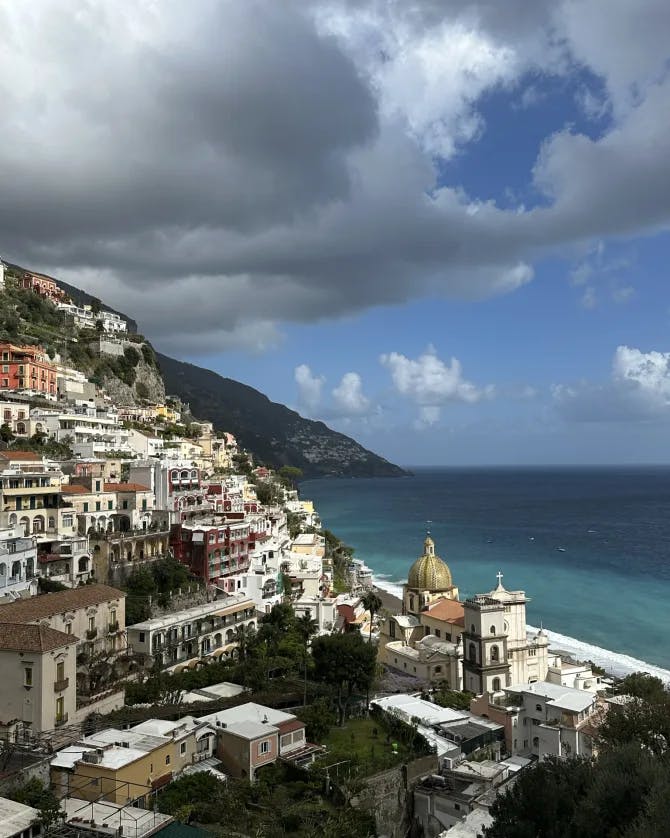 Picture of Amalfi Coast with a beautiful shoreline and hillside with gorgeous architecture. 