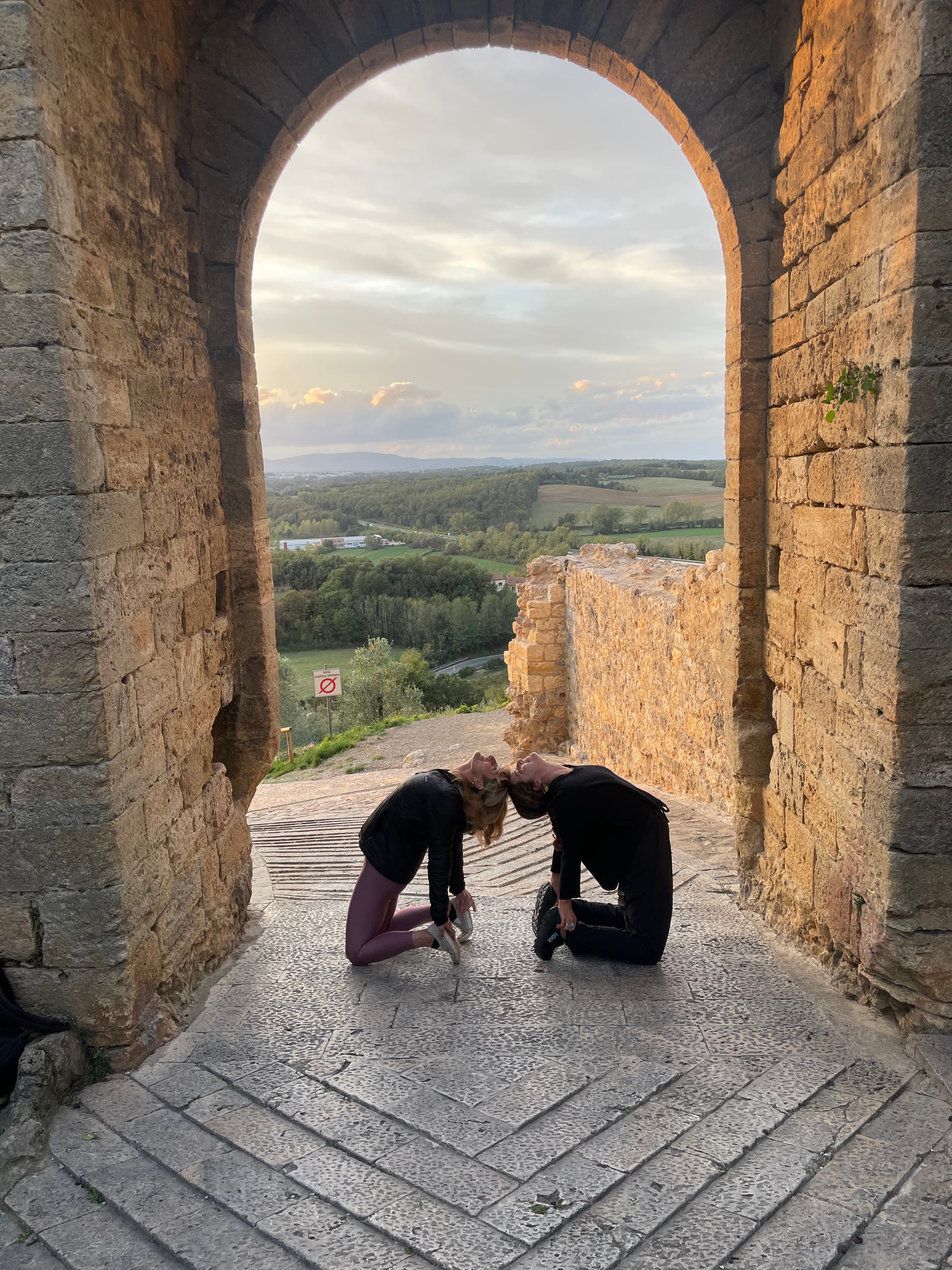 Yoga pose in Archway in Tuscany