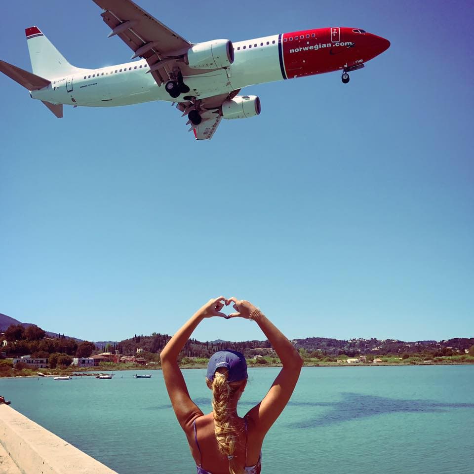 A jet flying over the sea.