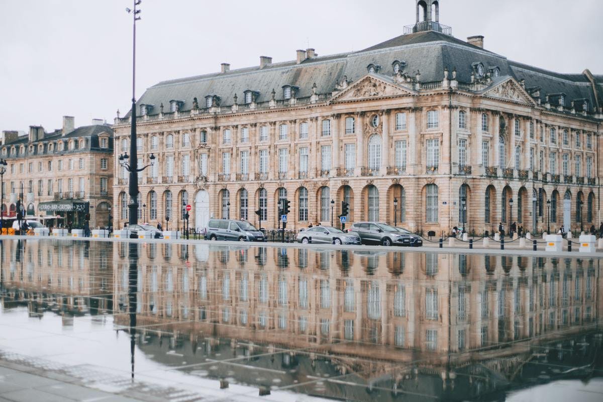Classic French architecture building in Bordeaux on a winter day.