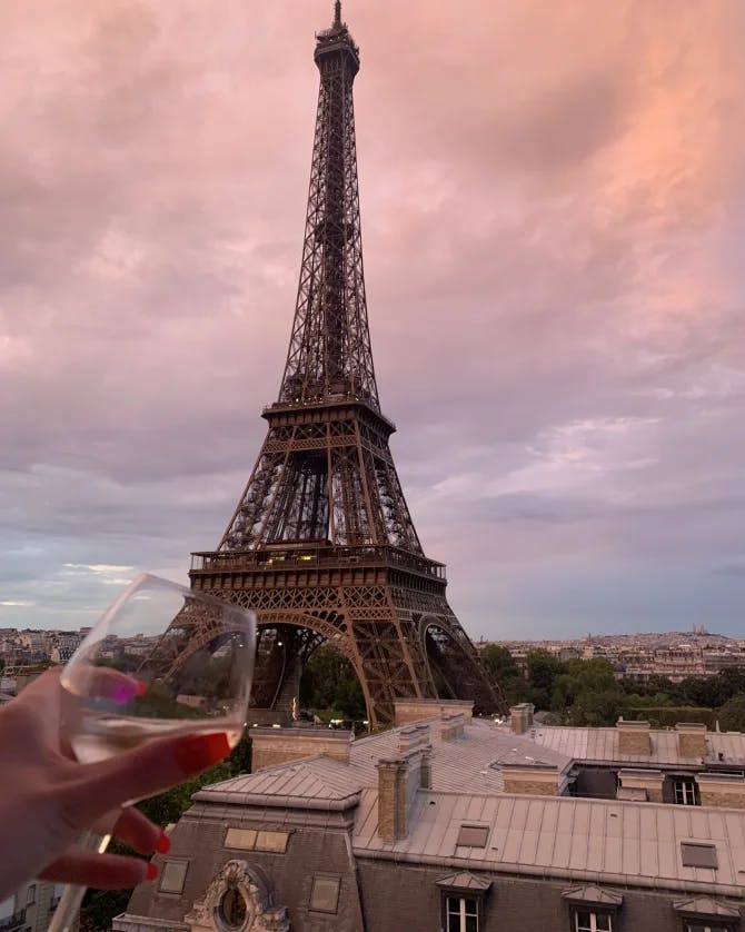 A glass of wine and the Eiffel Tower