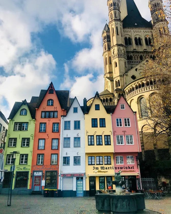 Picture of Great St Martin Church And Colorful Houses Of Cologne Germany