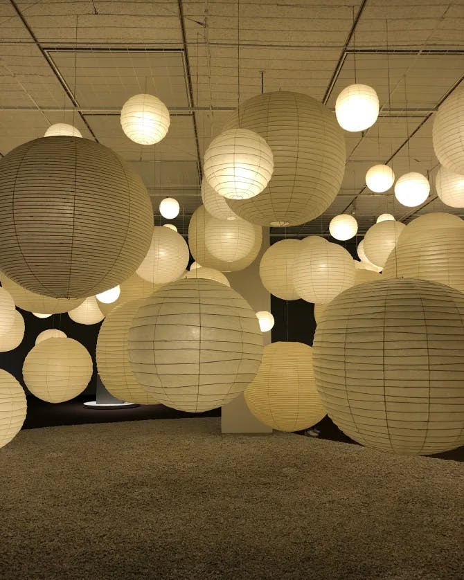 Room filled with paper lantern lights