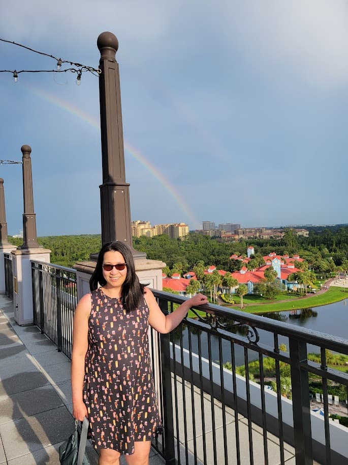 Picture of Thuy in black dress with canal view