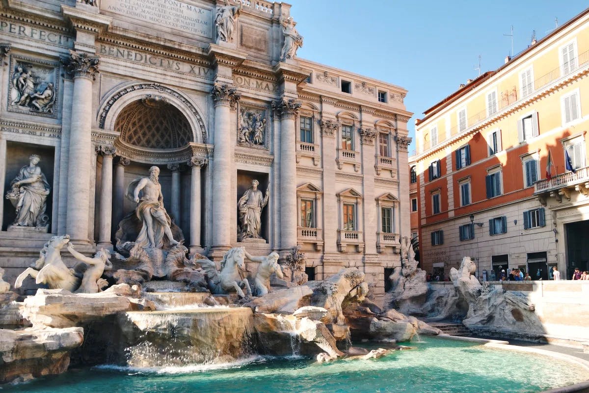 The Trevi Fountain is an iconic Baroque masterpiece in Rome, Italy, known for its stunning sculptures and the tradition of tossing a coin to ensure a return to the Eternal City.