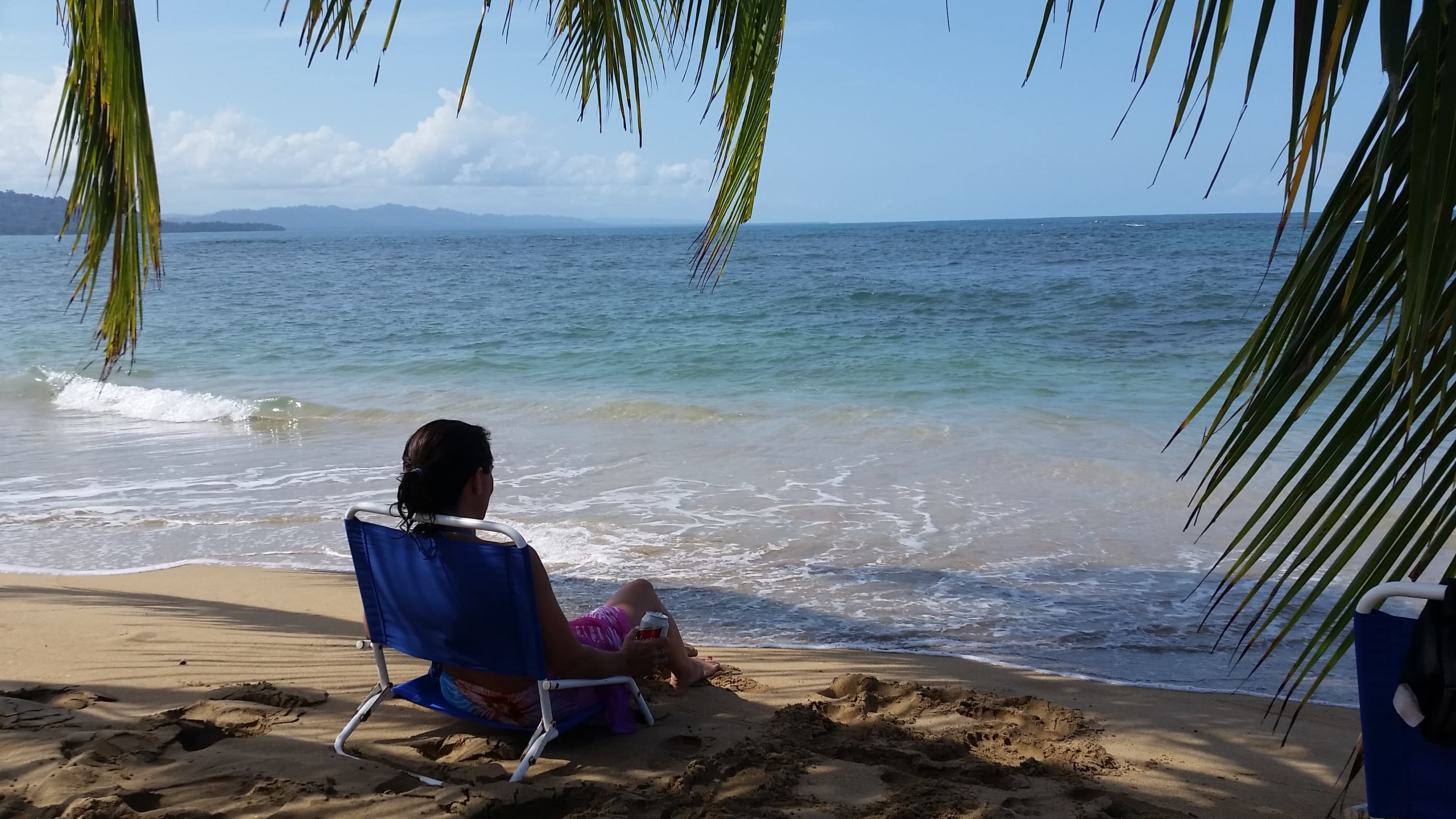 Woman sitting on a beach