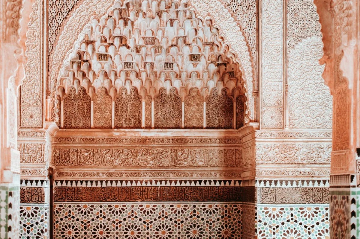 Up-close view of the detail work in Moroccan architecture, revealing geometric shapes and intricate designs