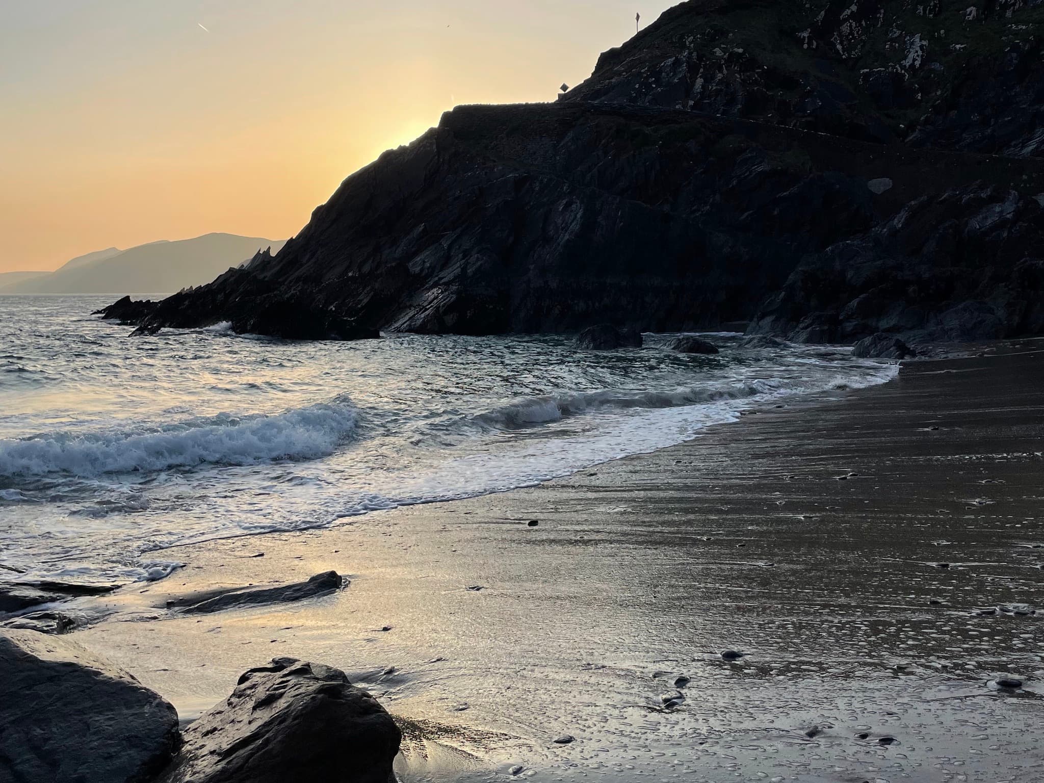 A beautiful view of beach at sunset