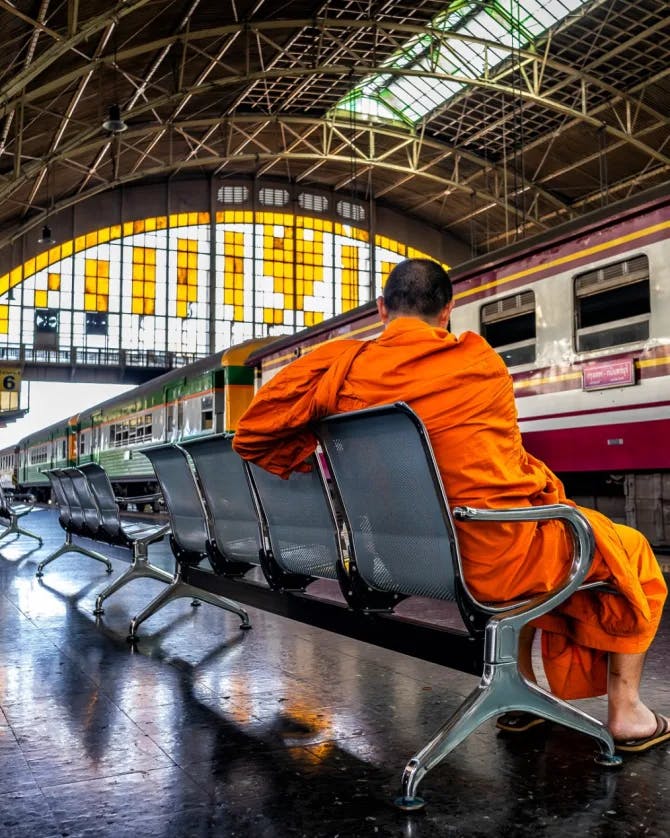 A monk waiting for a train