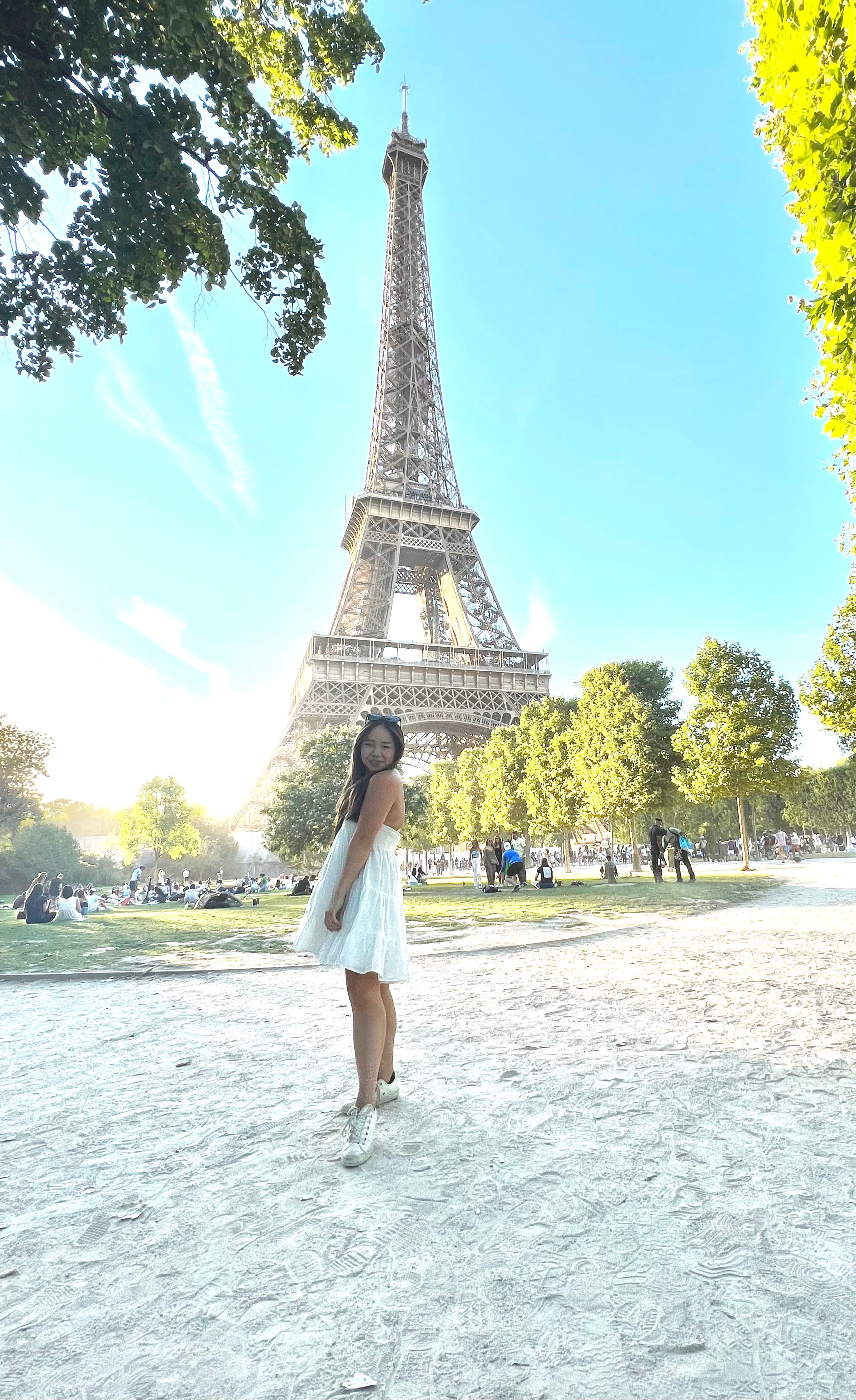 Travel advisor posing in front of Eiffel Tower