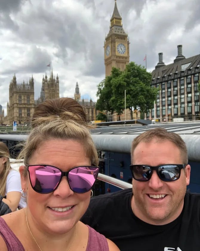 Travel advisor Michael with female companion posing in London with Big Ben in view