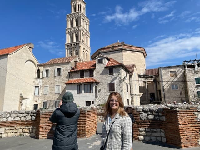 posing with a building