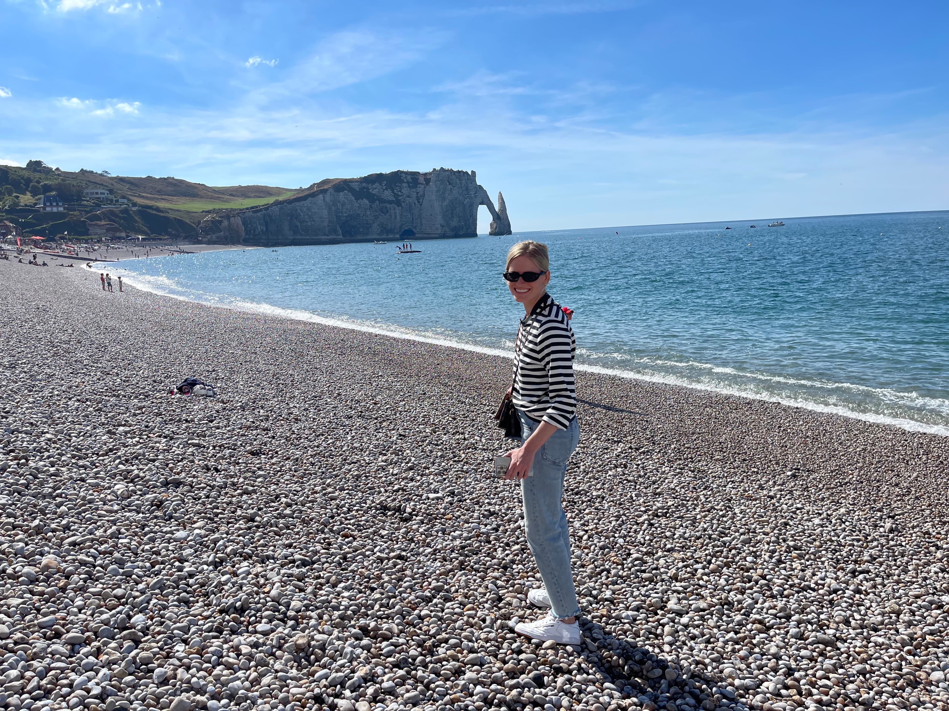 Travel advisor posing on the beach
