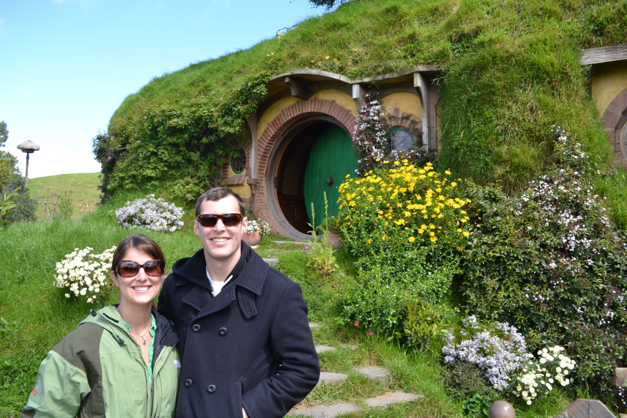 Katie Peters in front of a hobbit house in NZ