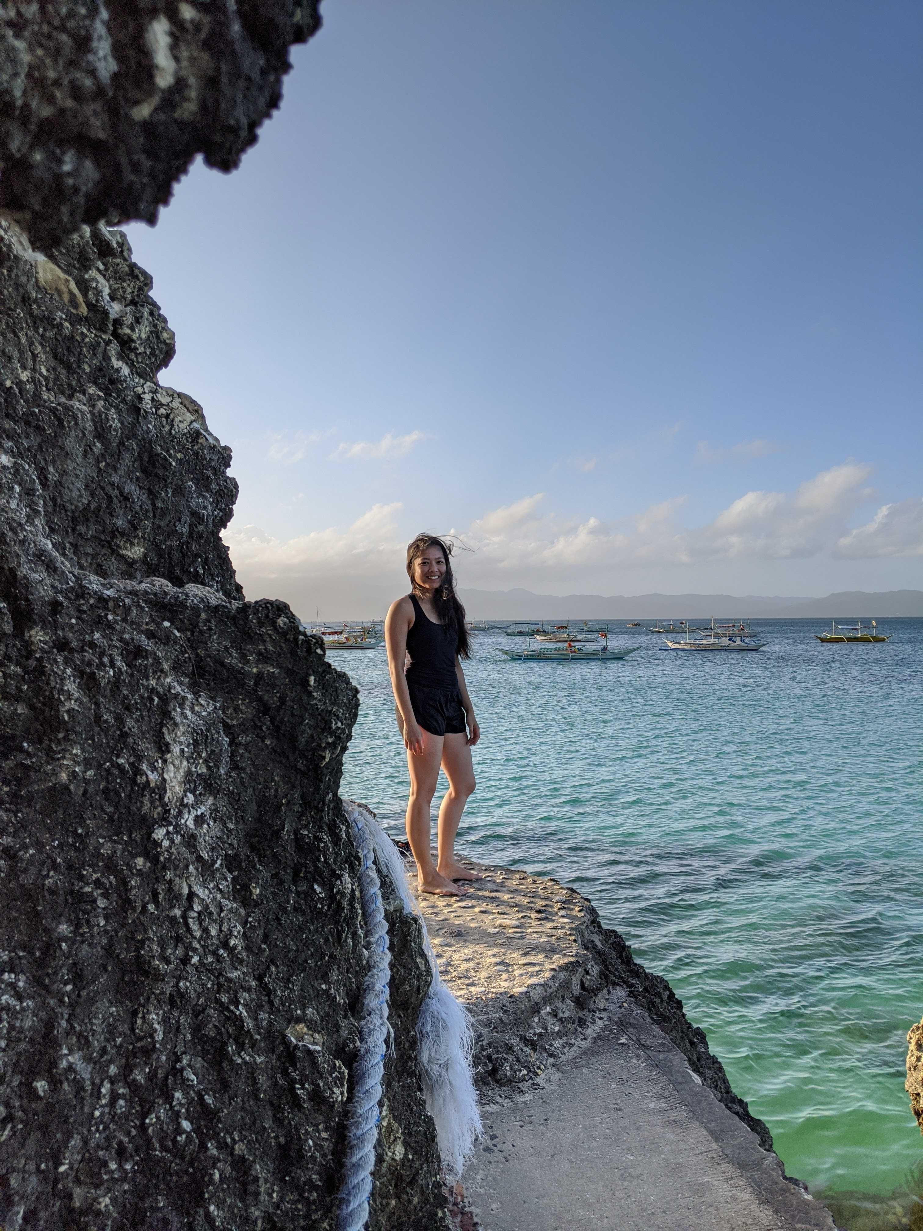 Princess on the end of pathway leading to rock