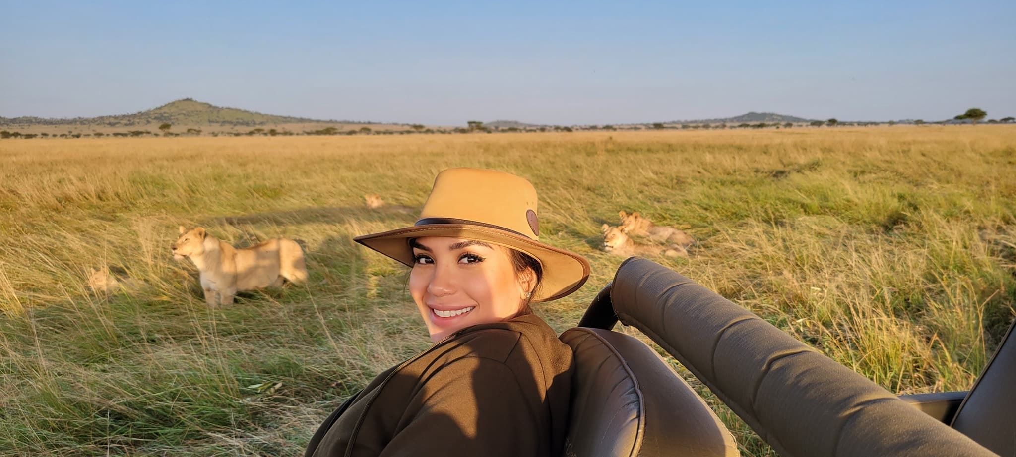 a woman posing and smiling.