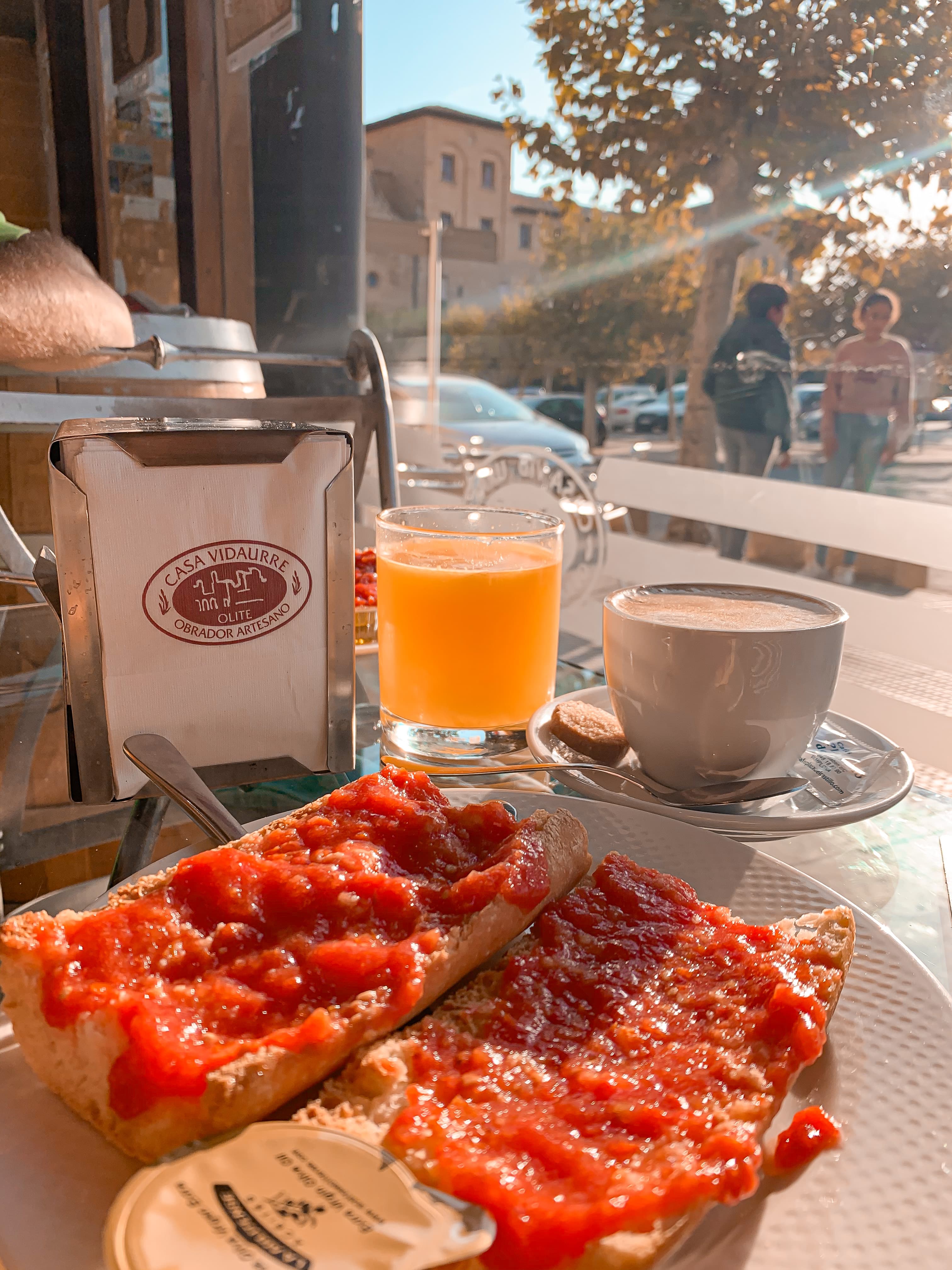 Breakfast table with toast, coffee and juice