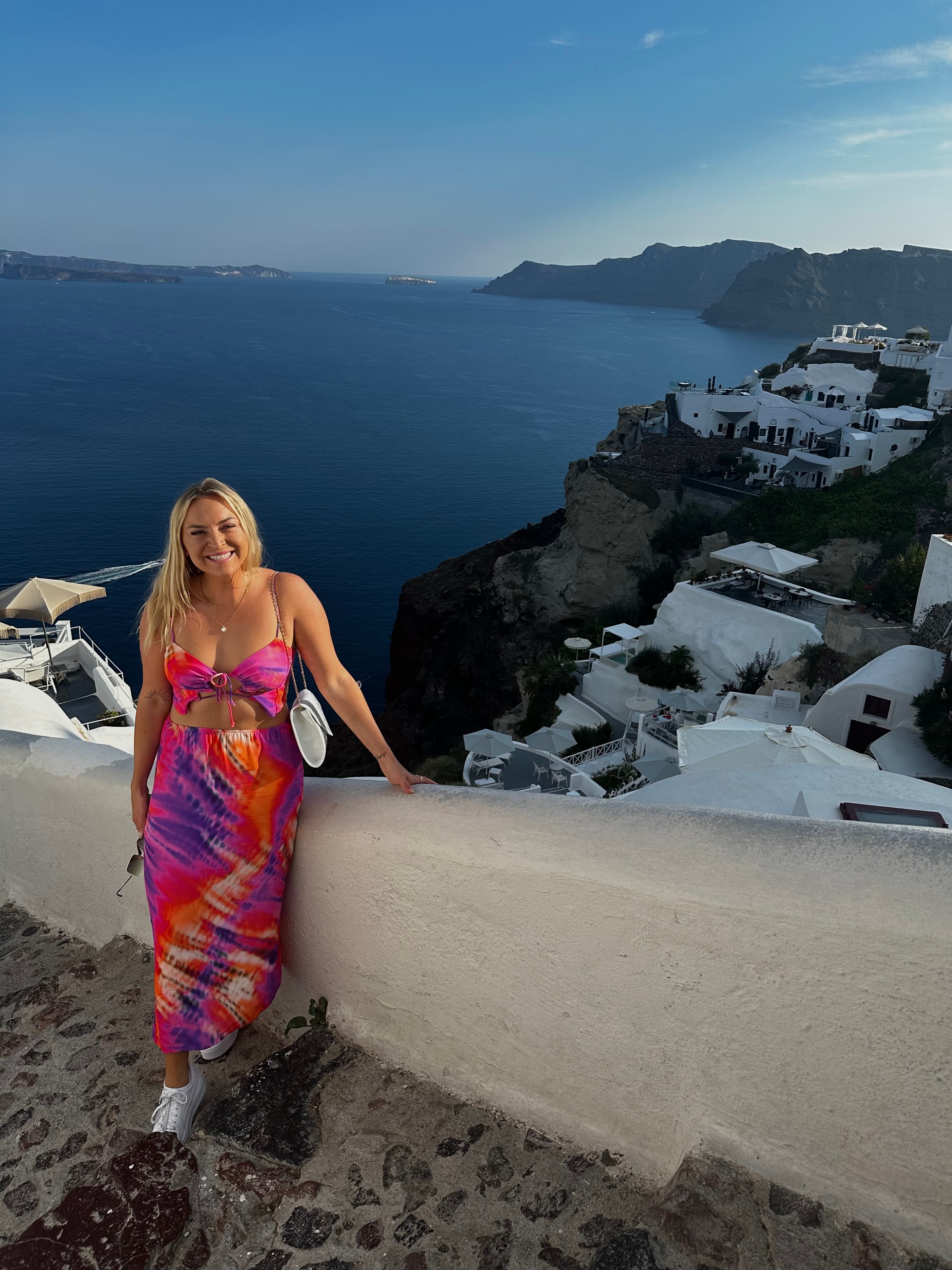 Posing for a photo in Santorini