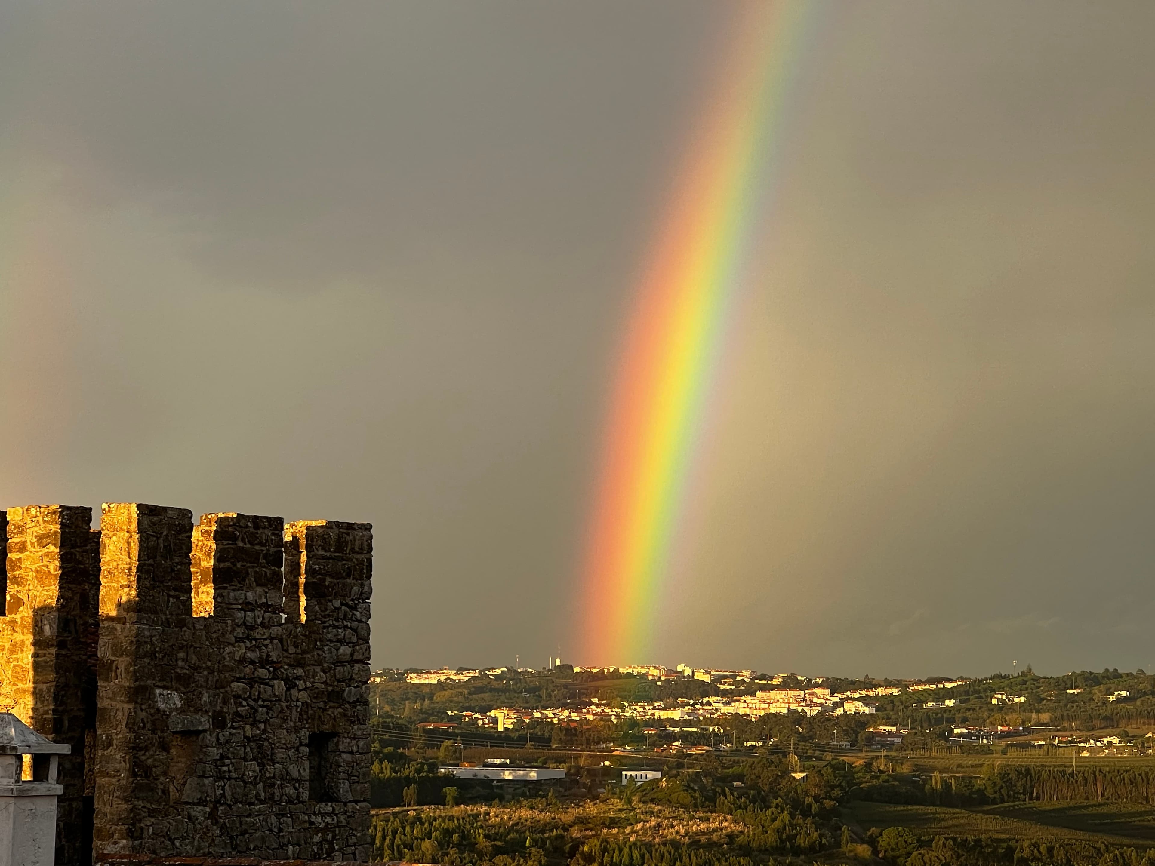 View of rainbow shinning on the sky