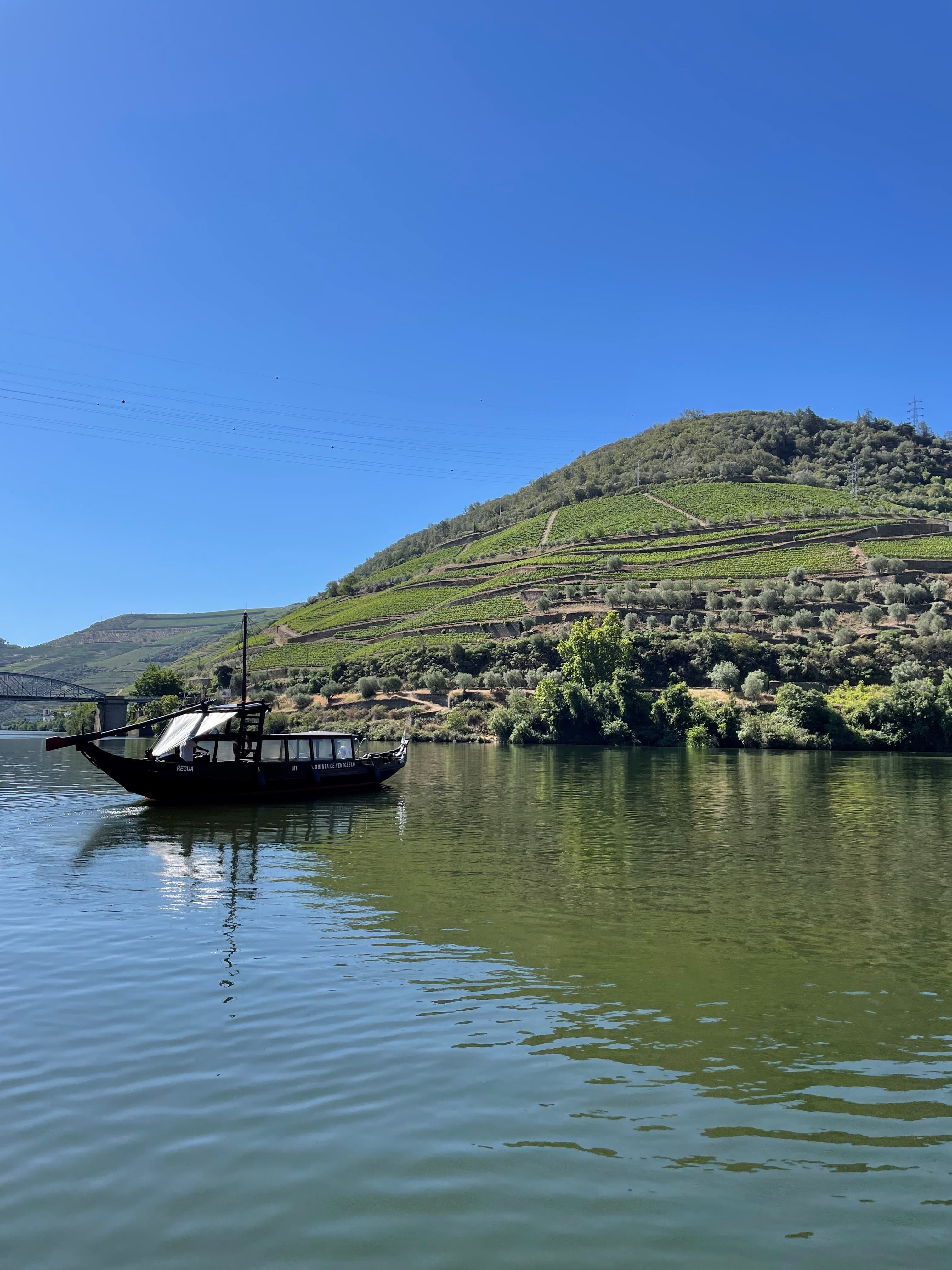 River, boat and mountain.