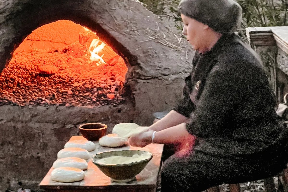 Lady-Baking-Bread-Morocco-travel-guide