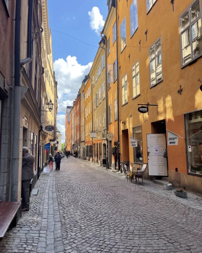 Picture of street with yellow building