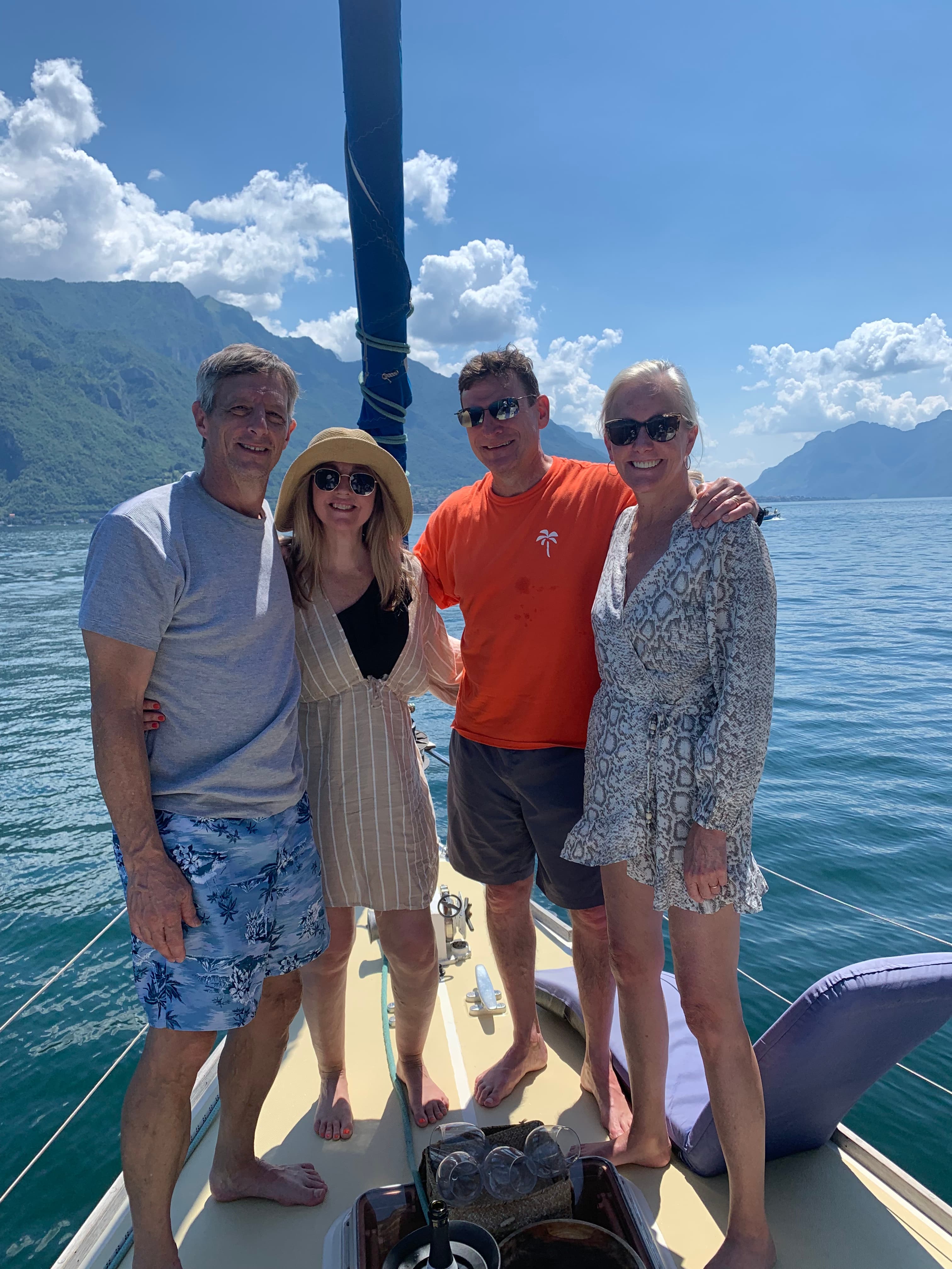 Wendy with a group of people on a yacht in the ocean.