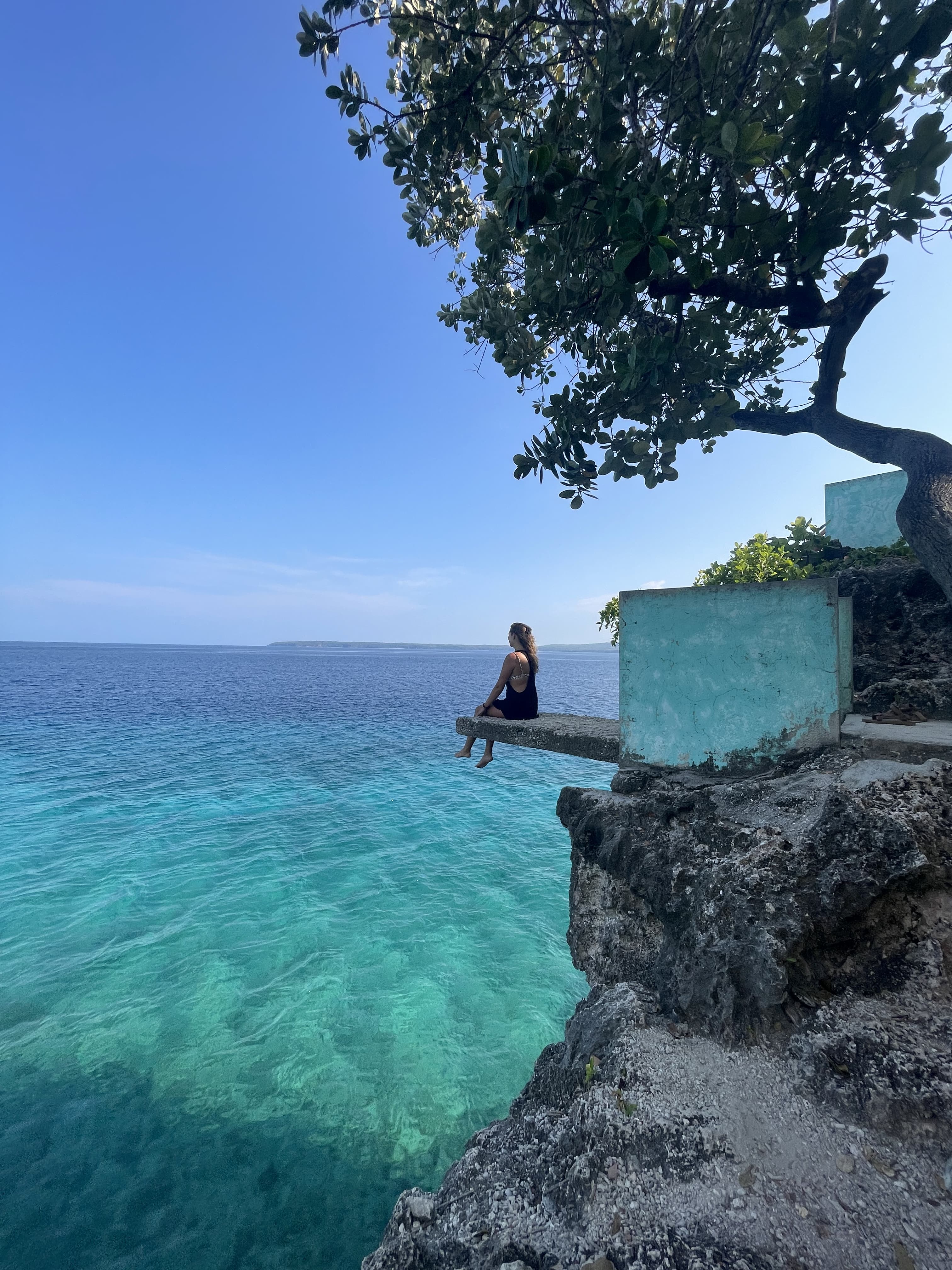 sitting over the ocean